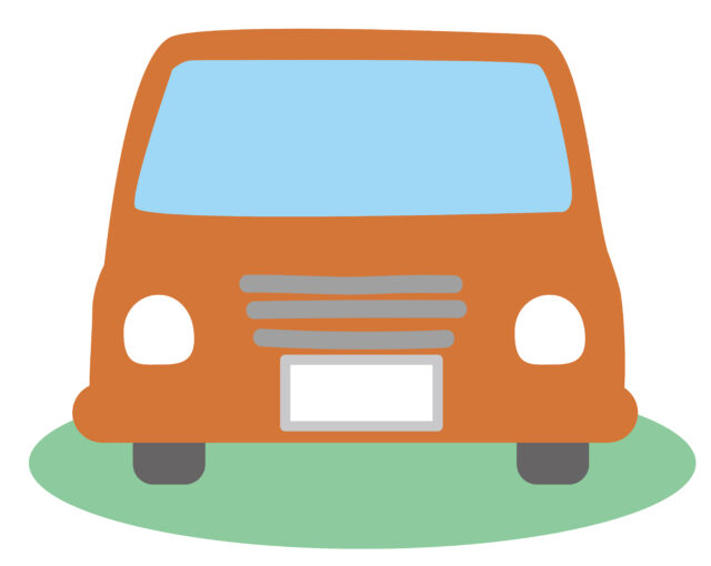 オレンジ色の車正面1