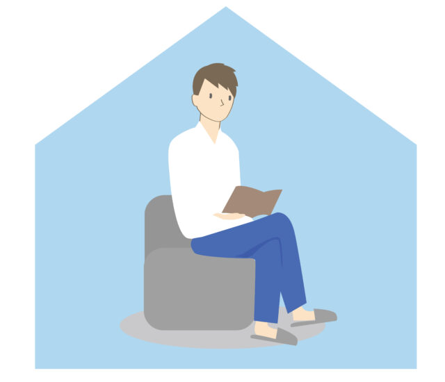 家で読書をする男性1