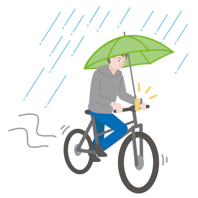 傘を固定して自転車に乗る1