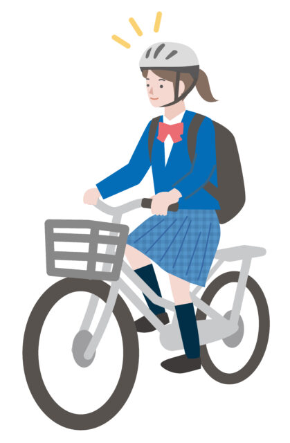 ヘルメットをかぶって自転車に乗る女子中高生