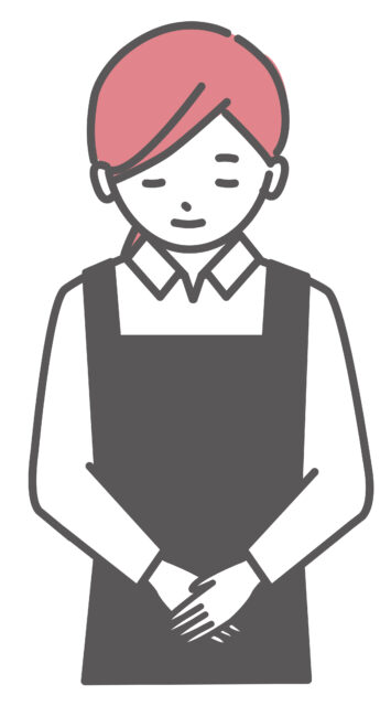 お辞儀をするエプロンの女性1