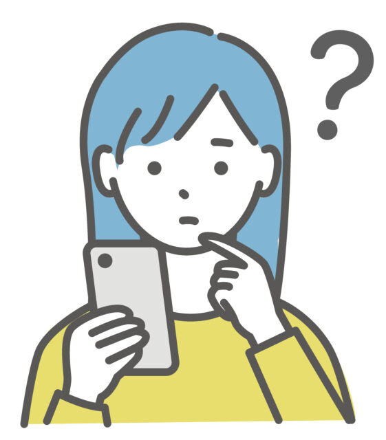 スマホを見て疑問を持つ女子1