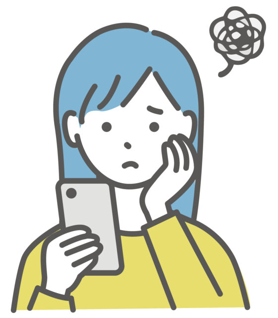 スマホを見て困惑する女子1