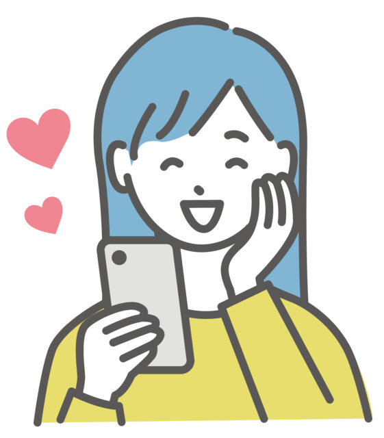 スマホを見て喜ぶ女子1